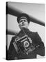Navy Soldier Holding Camera-George Strock-Stretched Canvas