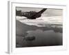 Navy Warplane Soaring over Tanahmerah Bay as Landing Craft Streaks For Beach Far Below-null-Framed Photographic Print