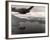 Navy Warplane Soaring over Tanahmerah Bay as Landing Craft Streaks For Beach Far Below-null-Framed Photographic Print