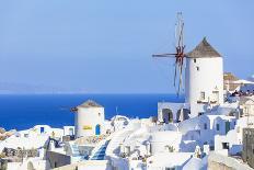 Greek Church with Three Blue Domes in the Village of Oia-Neale Clark-Photographic Print