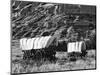 Nebraska, Scotts Bluff National Monument. Covered Wagons in Field-Dennis Flaherty-Mounted Photographic Print