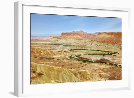 Negev Desert. Creek Meanders through the Picturesque Wilderness and Marked Bright Green Vegetation-kavram-Framed Photographic Print