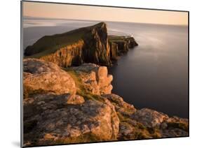 Neist Point and Lighthouse Bathed in Evening Light, Isle of Skye, Highland-Lee Frost-Mounted Photographic Print