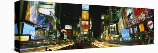 Neon Boards in a City Lit Up at Night, Times Square, New York City, New York, USA-null-Stretched Canvas