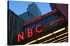 Neon lights of NBC Studios and Rainbow Room at Rockefeller Center, New York City, New York-null-Stretched Canvas