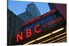 Neon lights of NBC Studios and Rainbow Room at Rockefeller Center, New York City, New York-null-Stretched Canvas