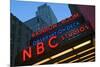 Neon lights of NBC Studios and Rainbow Room at Rockefeller Center, New York City, New York-null-Mounted Photographic Print