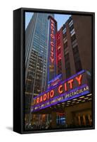 Neon lights of Radio City Music Hall at Rockefeller Center, New York City, New York-null-Framed Stretched Canvas