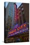 Neon lights of Radio City Music Hall at Rockefeller Center, New York City, New York-null-Stretched Canvas