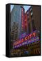 Neon lights of Radio City Music Hall at Rockefeller Center, New York City, New York-null-Framed Stretched Canvas