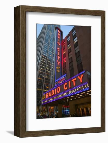 Neon lights of Radio City Music Hall at Rockefeller Center, New York City, New York-null-Framed Photographic Print