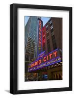 Neon lights of Radio City Music Hall at Rockefeller Center, New York City, New York-null-Framed Photographic Print