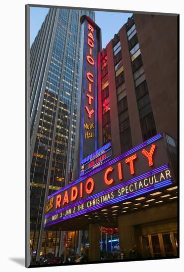 Neon lights of Radio City Music Hall at Rockefeller Center, New York City, New York-null-Mounted Photographic Print