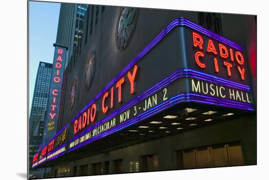 Neon lights of Radio City Music Hall at Rockefeller Center, New York City, New York-null-Mounted Photographic Print