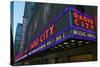 Neon lights of Radio City Music Hall at Rockefeller Center, New York City, New York-null-Stretched Canvas