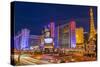 Neon Lights on Las Vegas Strip at Dusk with Car Headlights Leaving Streaks of Light-Eleanor Scriven-Stretched Canvas