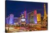 Neon Lights on Las Vegas Strip at Dusk with Car Headlights Leaving Streaks of Light-Eleanor Scriven-Stretched Canvas