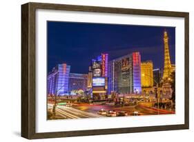 Neon Lights on Las Vegas Strip at Dusk with Car Headlights Leaving Streaks of Light-Eleanor Scriven-Framed Photographic Print