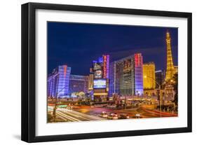 Neon Lights on Las Vegas Strip at Dusk with Car Headlights Leaving Streaks of Light-Eleanor Scriven-Framed Photographic Print