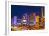 Neon Lights on Las Vegas Strip at Dusk with Car Headlights Leaving Streaks of Light-Eleanor Scriven-Framed Photographic Print