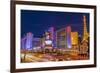 Neon Lights on Las Vegas Strip at Dusk with Car Headlights Leaving Streaks of Light-Eleanor Scriven-Framed Photographic Print