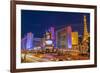 Neon Lights on Las Vegas Strip at Dusk with Car Headlights Leaving Streaks of Light-Eleanor Scriven-Framed Photographic Print