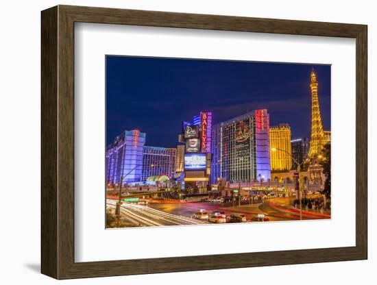 Neon Lights on Las Vegas Strip at Dusk with Car Headlights Leaving Streaks of Light-Eleanor Scriven-Framed Photographic Print