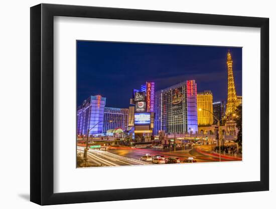 Neon Lights on Las Vegas Strip at Dusk with Car Headlights Leaving Streaks of Light-Eleanor Scriven-Framed Premium Photographic Print