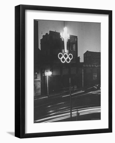 Neon Olympic Symbol in Melbourne-John Dominis-Framed Photographic Print