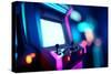 Neon Retro Arcade Machines In A Games Room-James Thew-Stretched Canvas