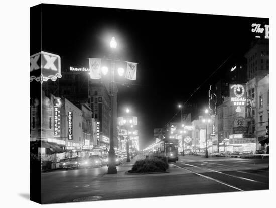 Neon Signs on Canal Street in New Orleans-null-Stretched Canvas