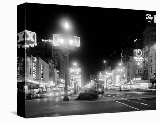 Neon Signs on Canal Street in New Orleans-null-Stretched Canvas