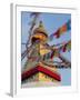 Nepal, Kathmandu, Swayambhunath Stupa and fluttering prayer flags in motion-Merrill Images-Framed Photographic Print