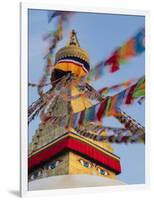Nepal, Kathmandu, Swayambhunath Stupa and fluttering prayer flags in motion-Merrill Images-Framed Photographic Print