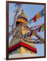 Nepal, Kathmandu, Swayambhunath Stupa and fluttering prayer flags in motion-Merrill Images-Framed Photographic Print