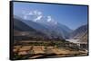 Nepal, Mustang, Kagbeni. the Soaring Peak of Nilgiri Behind the Village of Kagbeni.-Katie Garrod-Framed Stretched Canvas