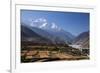 Nepal, Mustang, Kagbeni. the Soaring Peak of Nilgiri Behind the Village of Kagbeni.-Katie Garrod-Framed Photographic Print