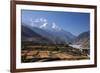 Nepal, Mustang, Kagbeni. the Soaring Peak of Nilgiri Behind the Village of Kagbeni.-Katie Garrod-Framed Photographic Print