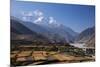 Nepal, Mustang, Kagbeni. the Soaring Peak of Nilgiri Behind the Village of Kagbeni.-Katie Garrod-Mounted Photographic Print