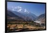 Nepal, Mustang, Kagbeni. the Soaring Peak of Nilgiri Behind the Village of Kagbeni.-Katie Garrod-Framed Premium Photographic Print