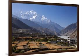 Nepal, Mustang, Kagbeni. the Soaring Peak of Nilgiri Behind the Village of Kagbeni.-Katie Garrod-Framed Photographic Print