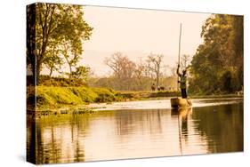 Nepalese gondolier in Chitwan National Forest, Nepal, Asia-Laura Grier-Stretched Canvas