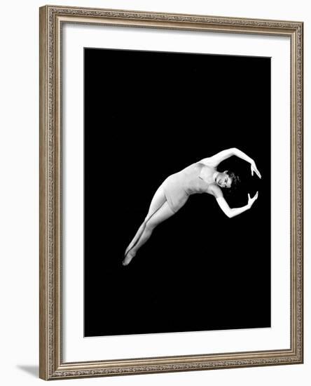 Neptune's Daughter, Esther Williams In A Swimming Pose From One Of Her Water Ballets, 1949-null-Framed Photo