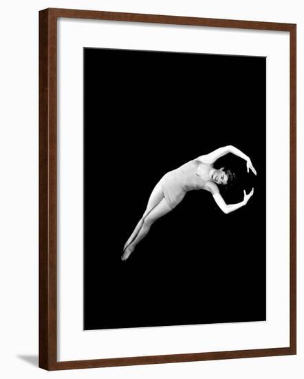 Neptune's Daughter, Esther Williams In A Swimming Pose From One Of Her Water Ballets, 1949-null-Framed Photo