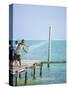 Net Fishing, Caye Caulker, Belize-Russell Young-Stretched Canvas