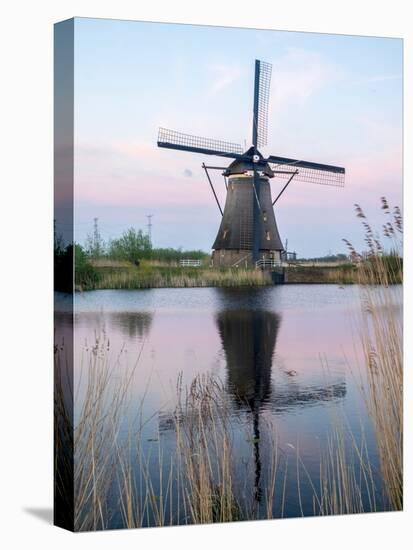 Netherland, Kinderdijk. Windmills along the canal.-Julie Eggers-Stretched Canvas