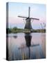 Netherland, Kinderdijk. Windmills along the canal.-Julie Eggers-Stretched Canvas