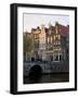 Netherlands, Amsterdam. Traditional houses along the canals and bridge crossing.-Julie Eggers-Framed Photographic Print