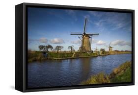 Netherlands, Kinderdijk. Traditional Dutch windmills-Walter Bibikow-Framed Stretched Canvas