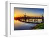 Netherlands, Kinderdijk. Windmill and bridge along the canal at sunrise-Terry Eggers-Framed Photographic Print